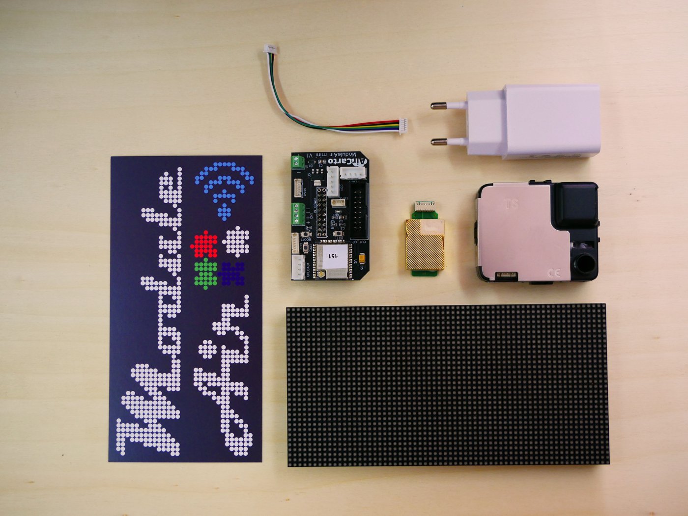 Les composants du ModuleAir : façade, carte AirCarto (ESP32), capteur CO₂, NextPM (particules fines), écran LED HUB75 et alimentation USB